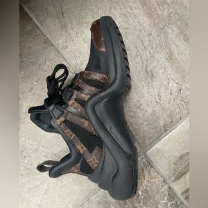 These are Louis Vuitton running shoes 80% new. black and brown.